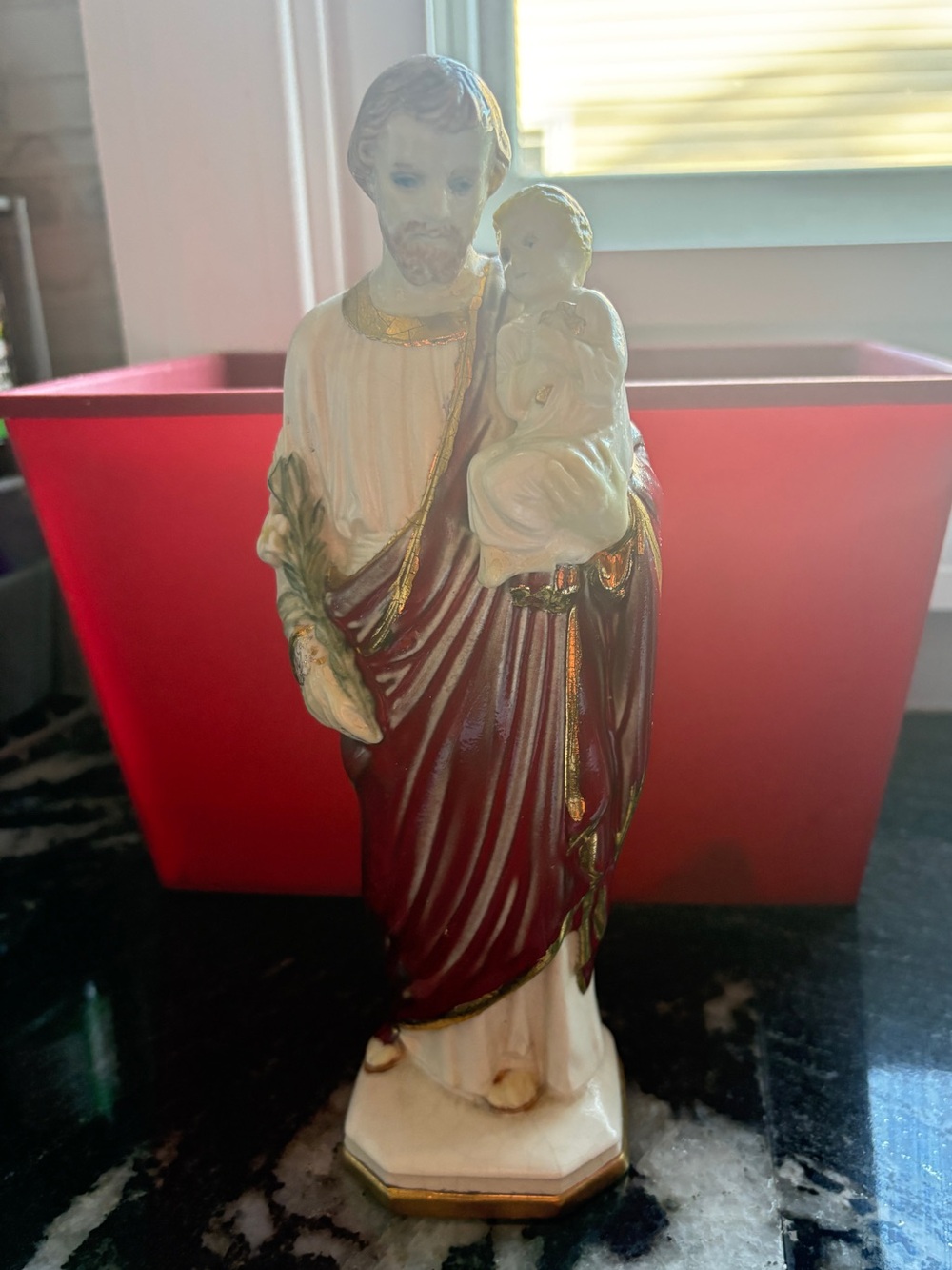 Saint Joseph holding child Jesus statue. Hand painted, ceramic. Nice detail.